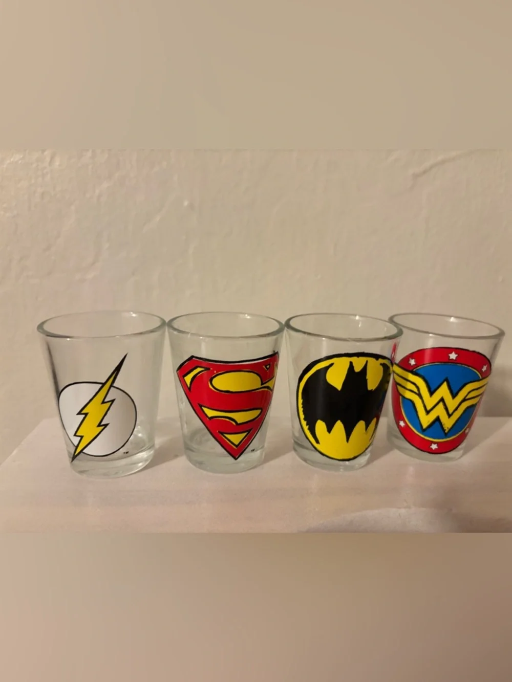 Superhero Emblem Shot Glasses — Set with Red, Yellow, Blue Designs